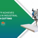 A vertical rotary blade cutting machine precisely slicing a white industrial foam block, illustrating AFP's advanced foam fabrication capabilities